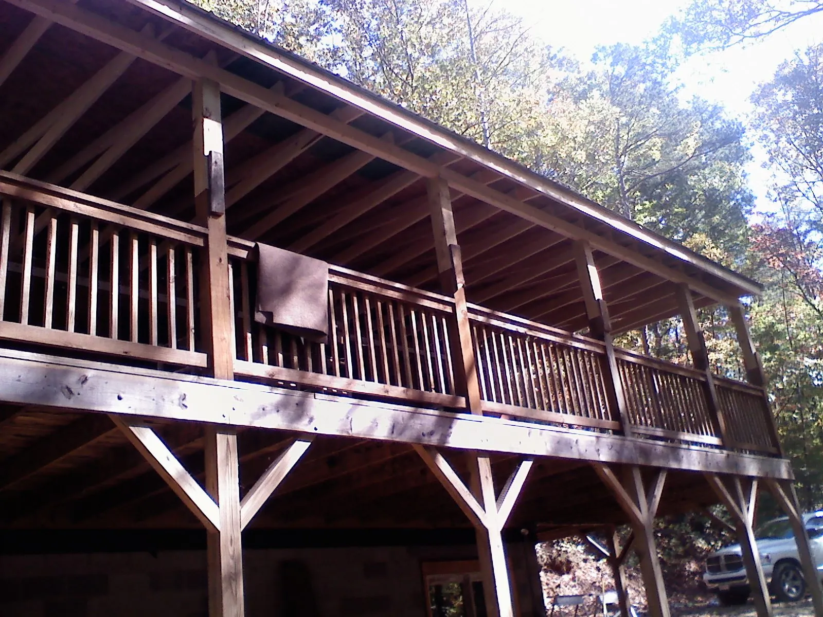 Timber framing under a new elevated porch and deck — Roof Leak Repair in Decaturville by Roofing Brothers